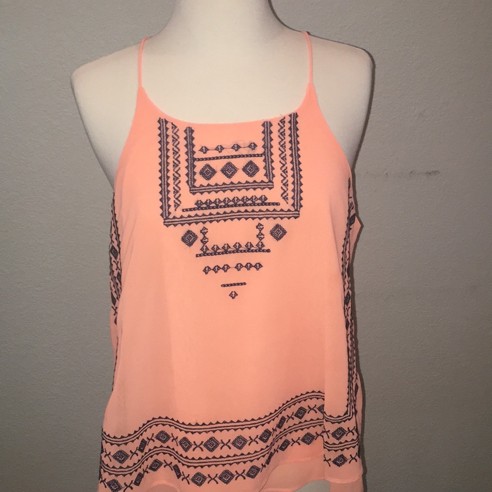 Fun and flirty coral tank